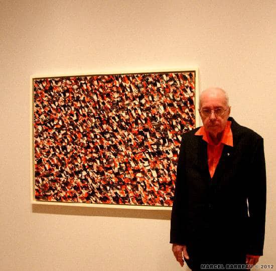 Author :Inconnu   Date : 23/10/2009 Marcel Barbeau in front of his painting "Ouvri", at the opeing of the exhibition "The Automatist Revolution" at the Varley Art Gallery, Martkam public Gallery, a Toronto suburb.